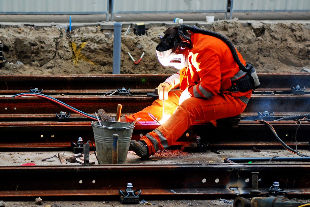 Track welder working on rail line.